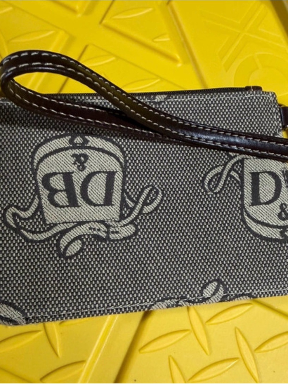 Dooney & Bourke Black and Cream Monogram Wristlet